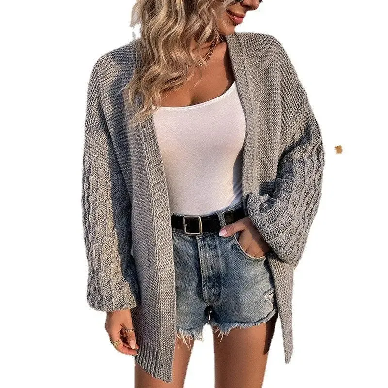 Elegant Oversized Knit Cardigan with Stylish Lantern Sleeves and Practical Pockets