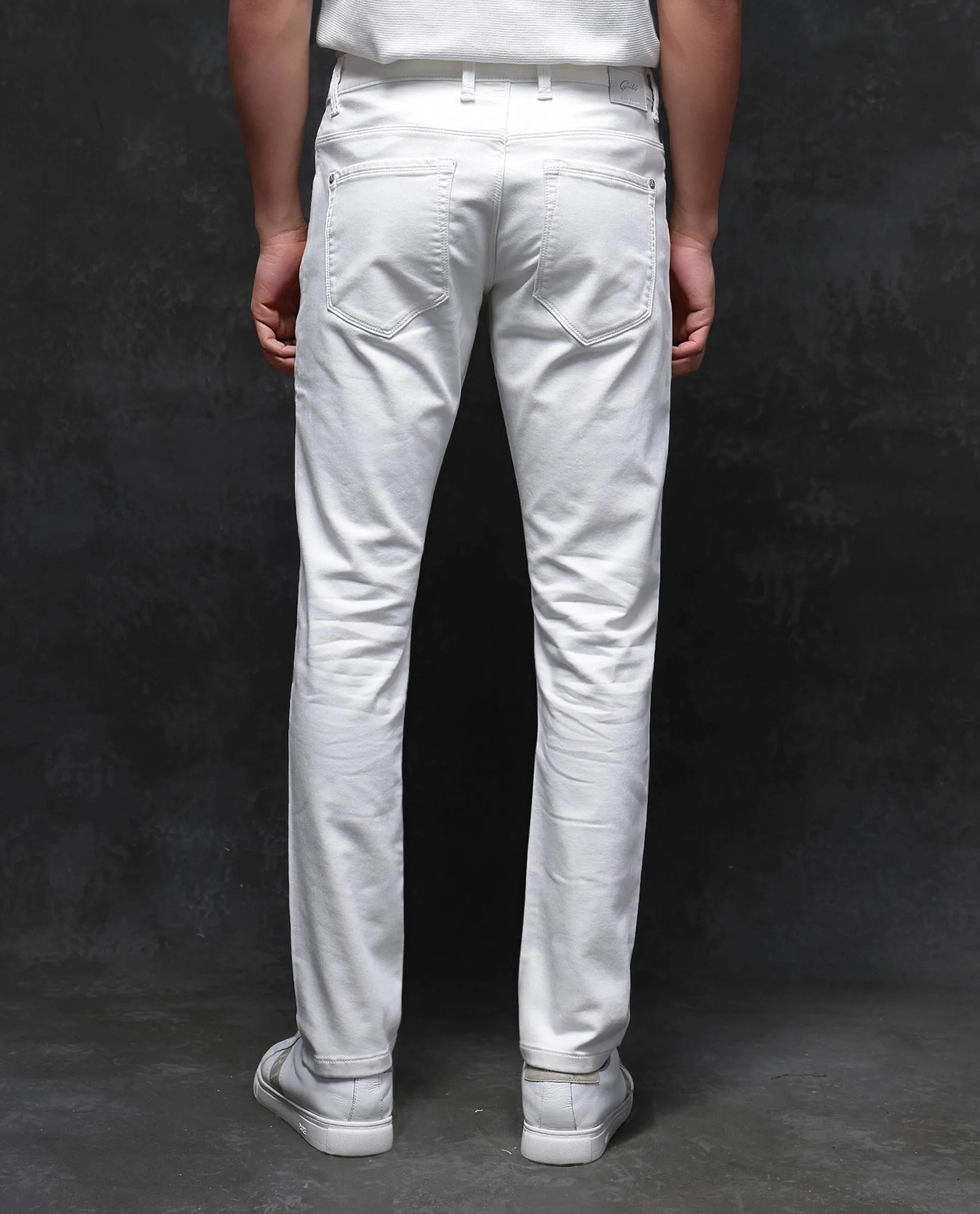 Rare Rabbit Men Corvo Off White Cotton Polyester Fabric Slim Fit Plain Denim Pant