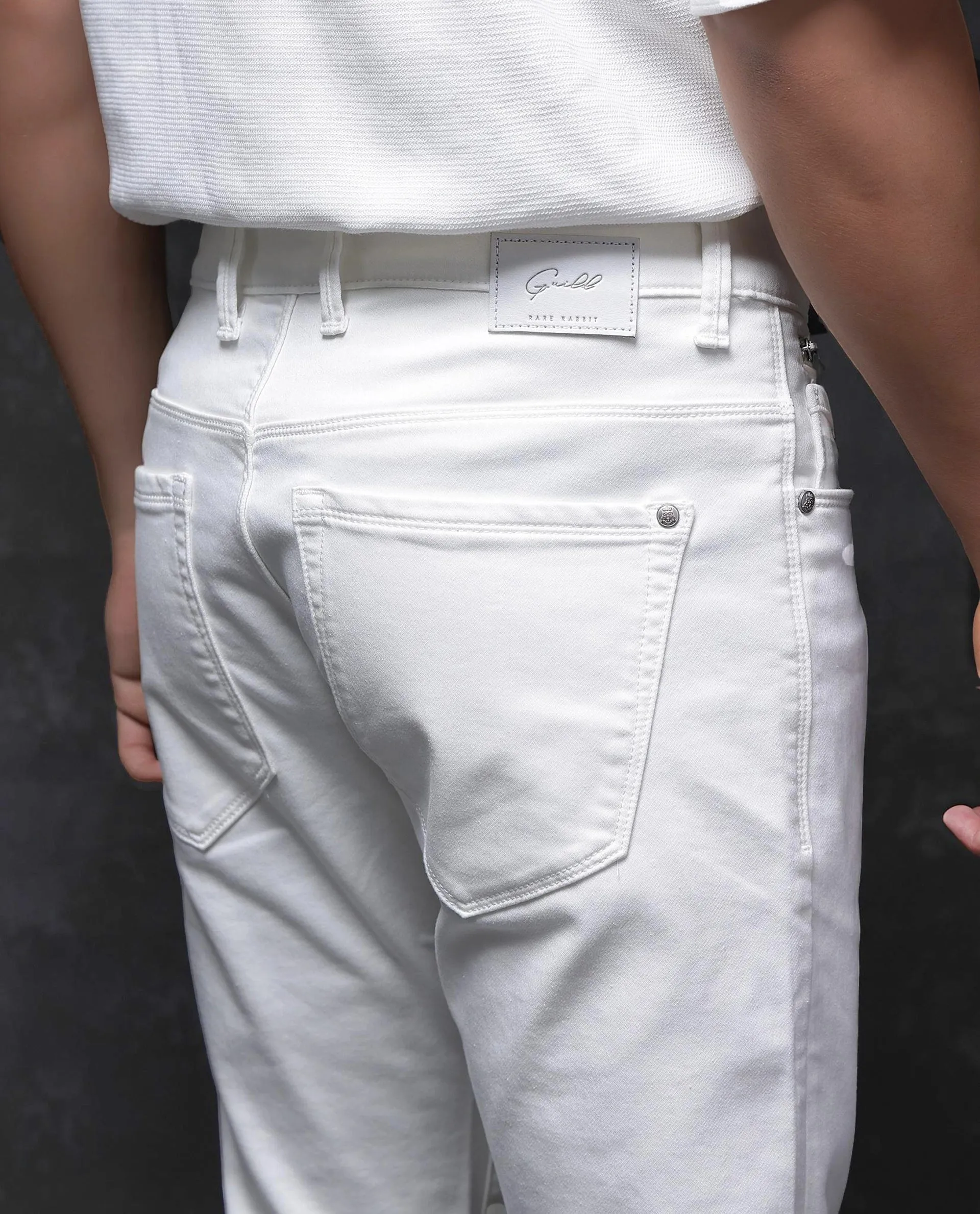 Rare Rabbit Men Corvo Off White Cotton Polyester Fabric Slim Fit Plain Denim Pant