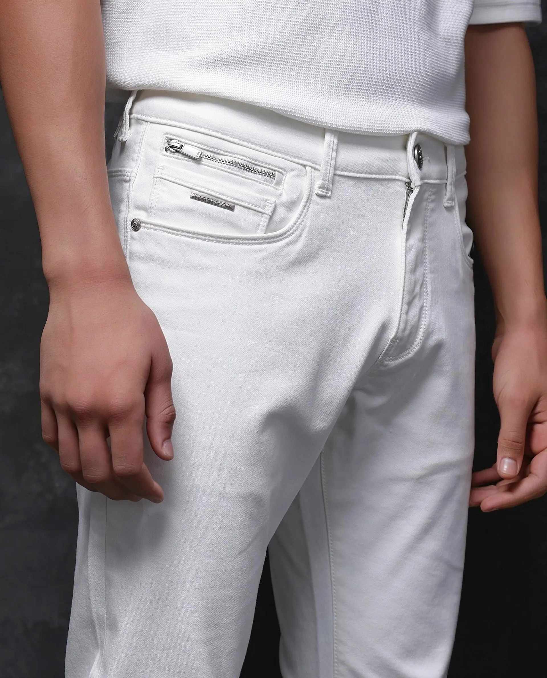 Rare Rabbit Men Corvo Off White Cotton Polyester Fabric Slim Fit Plain Denim Pant